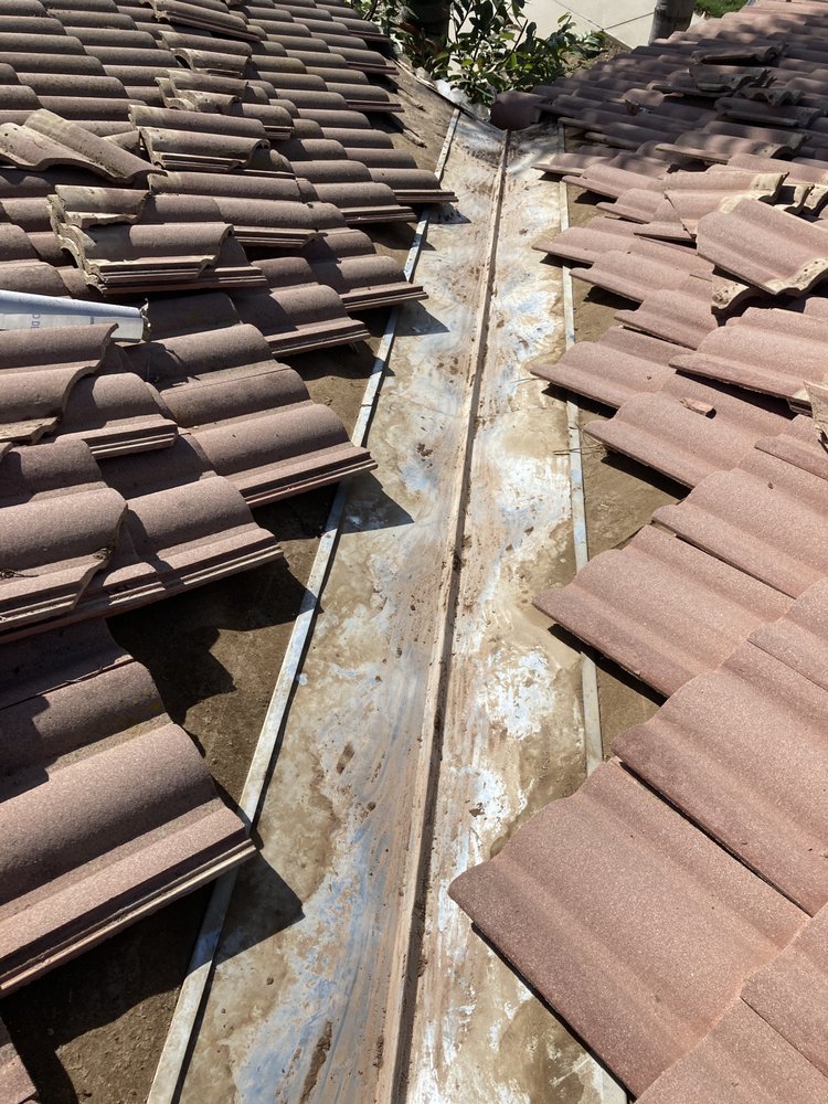 Slide of Top Valley Roofing