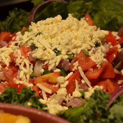 Cleburne Cafeteria - Delicious, feta and tomato salad with purple onions and bell peppers!