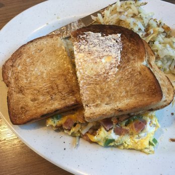 Farmer Boys - suspicious looking vegatable oil based butter-like flavored "spread" not even covering half of the toast - Breakfast & Brunch Near Me - Orange, California Farmer Boys - suspicious looking vegatable oil based butter-like flavored "spread" not even covering half of the toast - Breakfast & Brunch Near Me - Orange, California
