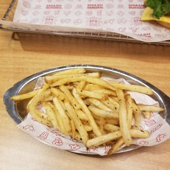 Smashburger - Smash fries, tossed in rosemary, garlic, and olive oil. Combo size - Burgers Near Me - Attleboro, Massachusetts Smashburger - Smash fries, tossed in rosemary, garlic, and olive oil. Combo size - Burgers Near Me - Attleboro, Massachusetts