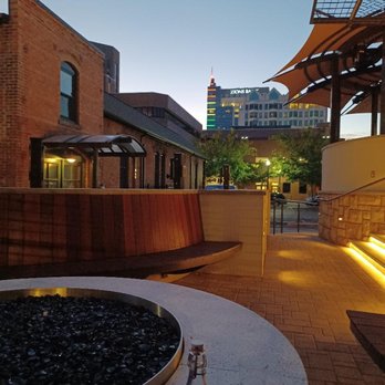Ochos Cocktail & Wine Bar - Fire pit at the bottom of the multi-level outdoor space - Wine Bars Near Me - Boise, Idaho Ochos Cocktail & Wine Bar - Fire pit at the bottom of the multi-level outdoor space - Wine Bars Near Me - Boise, Idaho