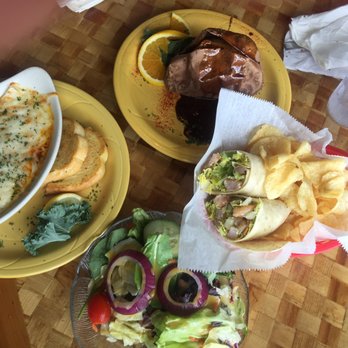 Squid Lips - Seafood Enchiladas, Drunken Sweet Potato, Shrimp Caesar Wrap, Side Salad - Seafood Near Me - Melbourne, Florida