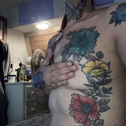 Sacred Art Tattoo