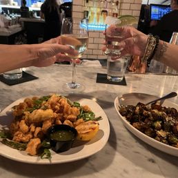 Calamari and Brussels sprouts with white wine and tequila