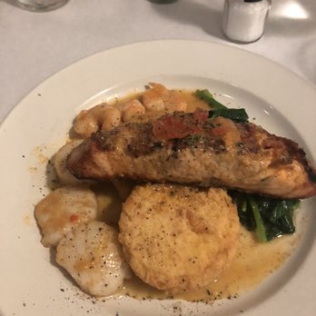 Madison's - Salmon with scallops, shrimp, fried grit cake and steamed spinach. - Seafood Near Me - Port Royal, South Carolina Madison's - Salmon with scallops, shrimp, fried grit cake and steamed spinach. - Seafood Near Me - Port Royal, South Carolina