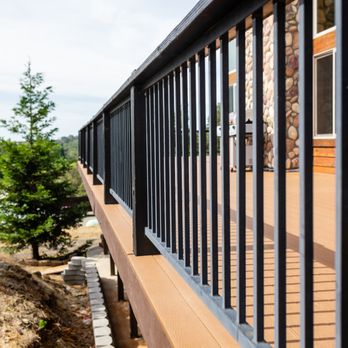 Edwards Construction - a view of a deck with a bench - General Contractors Near Me Edwards Construction - a view of a deck with a bench - General Contractors Near Me