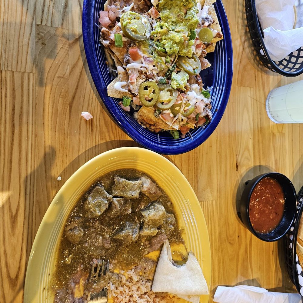 Katrina's Mexican Kitchen - Trozo de puerco en salsa verde..beans and rice. Alpastor nachos..with a few pieces of meat. - Mexican Near Me - Artesia, California Katrina's Mexican Kitchen - Trozo de puerco en salsa verde..beans and rice. Alpastor nachos..with a few pieces of meat. - Mexican Near Me - Artesia, California