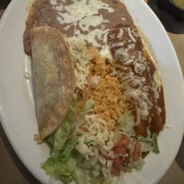 Beef taco and chicken enchilada combo plate