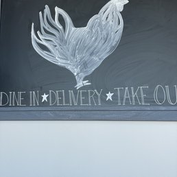 a chalk drawing of a rooster