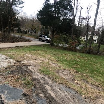 Landry Landscaping - The destruction to our front lawn that was left as seen in picture. - Landscaping Near Me - Attleboro, Massachusetts Landry Landscaping - The destruction to our front lawn that was left as seen in picture. - Landscaping Near Me - Attleboro, Massachusetts