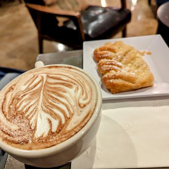 Village Coffee Roastery - a cup of coffee and a pastry - Coffee & Tea Near Me - Scottsdale, Arizona Village Coffee Roastery - a cup of coffee and a pastry - Coffee & Tea Near Me - Scottsdale, Arizona