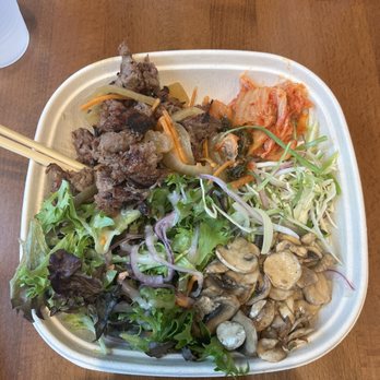KFire Korean BBQ - Soy ginger beef with side salad, green onion salad, kimchi, and marinated mushrooms. - Korean Near Me - Chicago, Illinois
