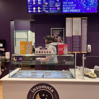 Insomnia Cookies - a woman behind the counter - Desserts Near Me - Saint Cloud, Minnesota