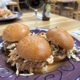 a plate of pulled pork sandwiches a plate of pulled pork sandwiches