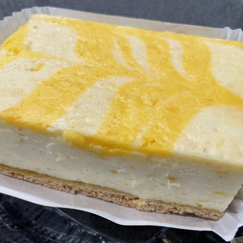 Posh Cakes - Mango cheesecake - Bakeries Near Me - Parker, Colorado Posh Cakes - Mango cheesecake - Bakeries Near Me - Parker, Colorado