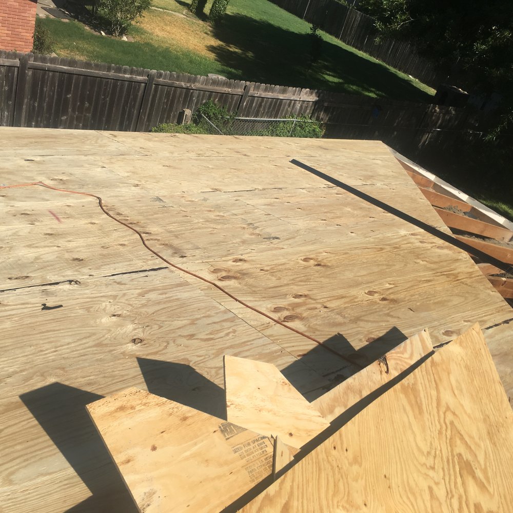 Slide of Mercedes Roofing