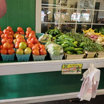 Sherry's Produce - a display of tomatoes, cucumbers, and other vegetables - Fruits & Veggies Near Me - Tucker, Georgia