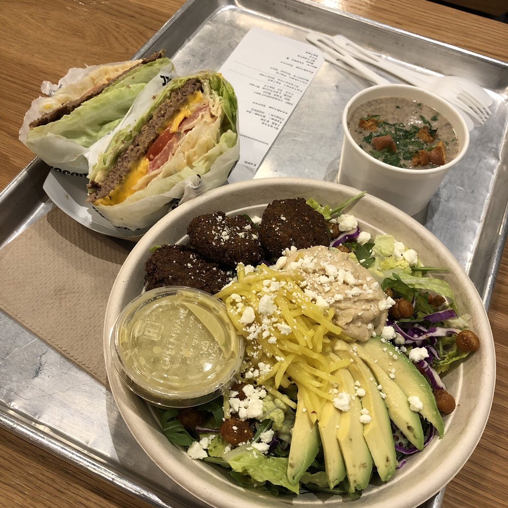 Gott's Roadside - Tope left corner: impossible burger with cheese in a lettuce wrap, cup of mushroom soup (specials menu), and falafel salad - American Near Me - Greenbrae, California Gott's Roadside - Tope left corner: impossible burger with cheese in a lettuce wrap, cup of mushroom soup (specials menu), and falafel salad - American Near Me - Greenbrae, California