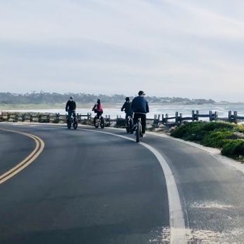 Big Sur Adventures - Cruising by Asilomar Beach on an e-bike--popular ride for families, couples, and anyone wanting coastal scenery and bike-friendly paths - Bike Rentals Near Me - Monterey, California