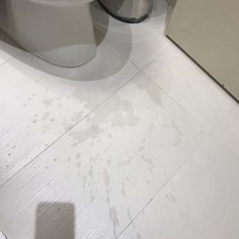 The Gotham Hotel - Don't even want to know what caused this stain on the bathroom floor! - Hotels Near Me - New York, New York