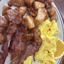 2 egg breakfast with fried potatoes.