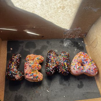 Machino Donuts - a box of doughnuts with sprinkles - Donuts Near Me - Toronto, Ontario