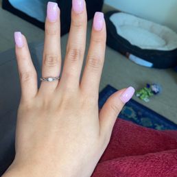 Pink acrylic gel nails with sparkles