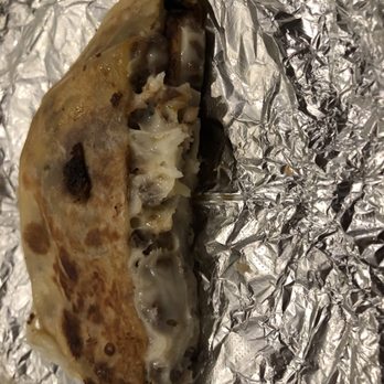 Taqueria Durango - a piece of food wrapped in tin foil - Food Trucks Near Me - Alvin, Texas Taqueria Durango - a piece of food wrapped in tin foil - Food Trucks Near Me - Alvin, Texas