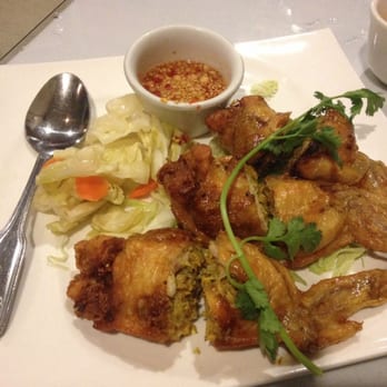 Phnom Penh House - SLAAP MOARN BORG - Boneless chicken wings stuffed w / lemongrass spices, bean thread, meat, black mushroom, onion - Cambodian Near Me - Alameda, California Phnom Penh House - SLAAP MOARN BORG - Boneless chicken wings stuffed w / lemongrass spices, bean thread, meat, black mushroom, onion - Cambodian Near Me - Alameda, California