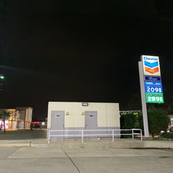 Chevron - Restrooms are outside. I didn't notice them until I saw someone walking towards these "outhouses" Convenience is key!