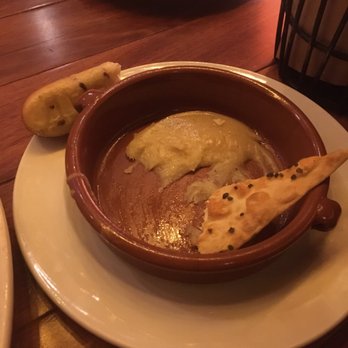 Seasons 52 - cheese fondue small, not in a traditional fondue pot explains the low price and calorie count. still good if you eat it fast! - New American Near Me - Chestnut Hill, Massachusetts