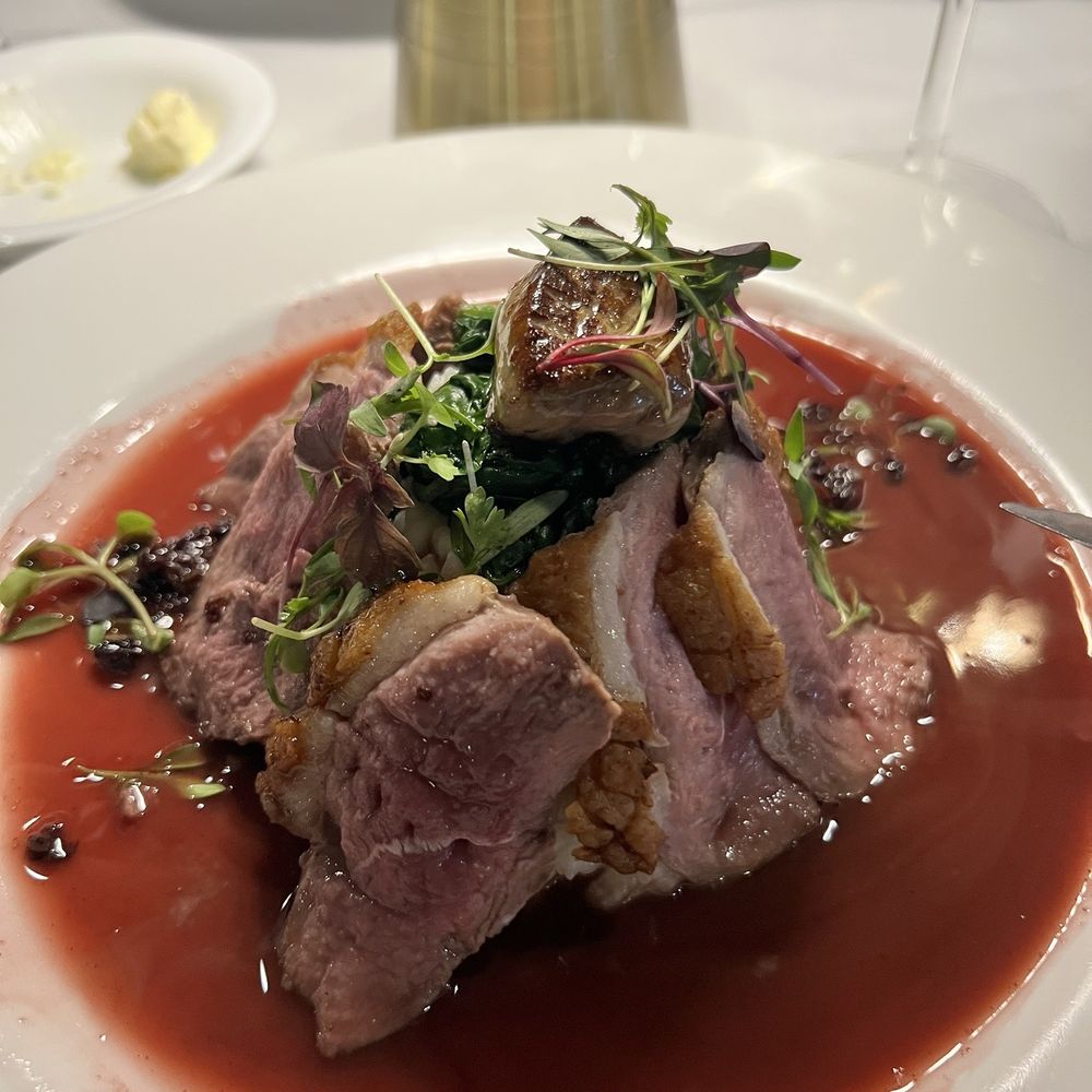 Bistro By Chef Bass - Hudson Valley Duck Breast with foie gras over risotto - Salad Near Me - Point Pleasant Beach, New Jersey Bistro By Chef Bass - Hudson Valley Duck Breast with foie gras over risotto - Salad Near Me - Point Pleasant Beach, New Jersey
