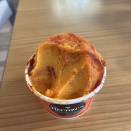 Chili mango ice cream (with a few bites gone) Chili mango ice cream (with a few bites gone)