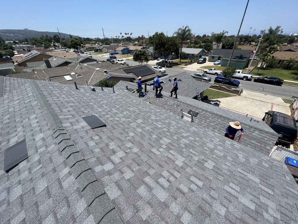 Slide of Green Shield Roofing