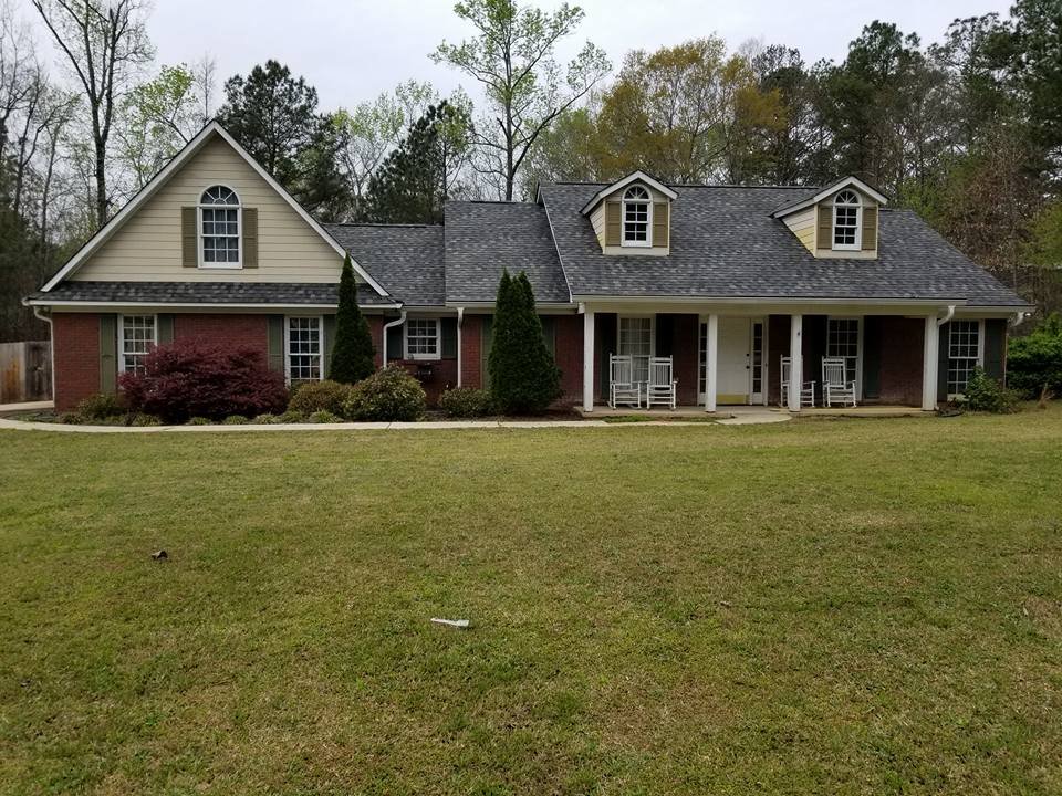 Slide of Todd Chapman Roofing