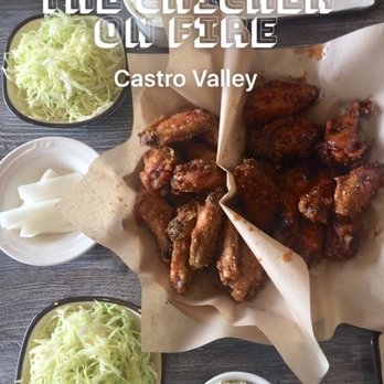 The Chicken On Fire - M1- 16 wings Left is Soy Garlic while the right is Spicy- Medium. Second time coming here and it's still soooo good!! - Chicken Wings Near Me - Castro Valley, California The Chicken On Fire - M1- 16 wings Left is Soy Garlic while the right is Spicy- Medium. Second time coming here and it's still soooo good!! - Chicken Wings Near Me - Castro Valley, California