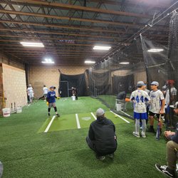 Legacy Athletics Batting Cages - Rain or shine, the team got our work in. This place had enough space to get some grounding work in. Great place to get some swings in