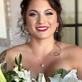 Bride Guide Pros  - Stunning bold red lips on this Orange Beach bride - Makeup Artists Near Me
