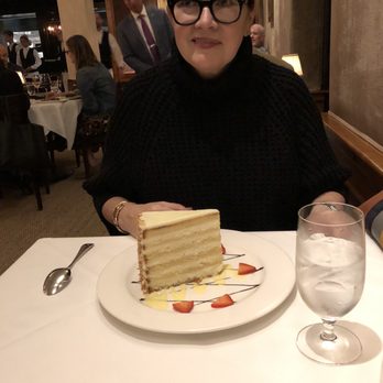 Peninsula Grill - Coconut cake - New American Near Me - Charleston, South Carolina Peninsula Grill - Coconut cake - New American Near Me - Charleston, South Carolina