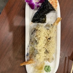 Mene Sushi - One of lunch specials accompanied by miso soup and ginger side salad . Yummy!