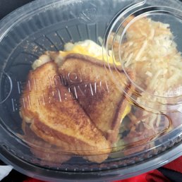 a waffle house sandwich and hash browns
