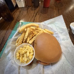 Pulled pork sandwich with mac & cheese and french fries fries