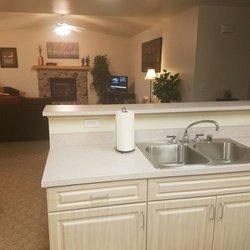 Creekside Continuing Care Community - You're able to socialize and keep an eye on dinner with this great layout.