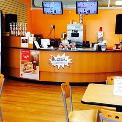 Cool J's Premium Water Ice - Comfortable indoor seating, good music playing, watch some tv. It's the best place to chill.