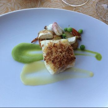 Auberge du Soleil - Halibut crusted with onion over vegetable medley - Hotels Near Me - Rutherford, California Auberge du Soleil - Halibut crusted with onion over vegetable medley - Hotels Near Me - Rutherford, California