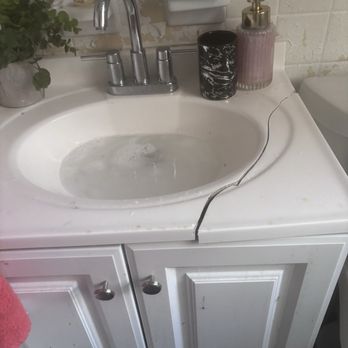 Progress Residential - The crack and the bathroom sink that was already there when we moved that it was glued down that we got charged $400 for - Property Management Near Me - Alpharetta, Georgia Progress Residential - The crack and the bathroom sink that was already there when we moved that it was glued down that we got charged $400 for - Property Management Near Me - Alpharetta, Georgia
