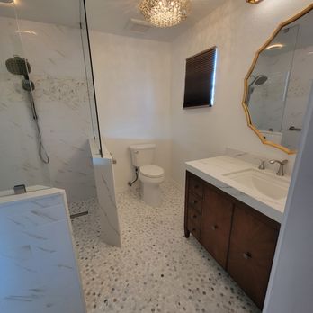 Yuma Tile & Design - a bathroom with a marble floor - Tiling Near Me - Yuma, Arizona