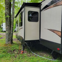 J & J Campgrounds - Tree so close to slide.
