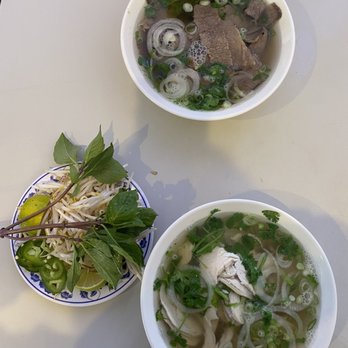 Pho 75 - two bowls of pho with meat and vegetables - Vietnamese Near Me - Philadelphia, Pennsylvania