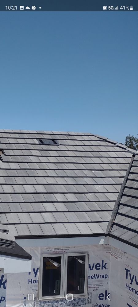 Slide of Hernandez Roofing